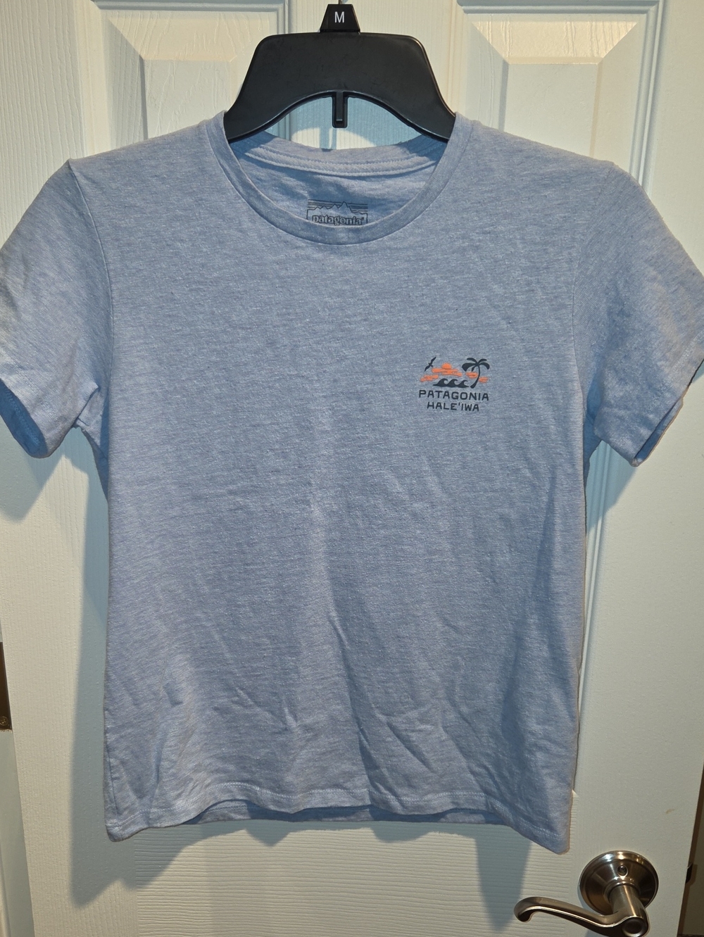 Patagonia Heather Light Blue Short Sleeve Tee with Small Tropical Logo